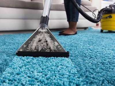 person-using-an-at-home-carpet-cleaner-768x432